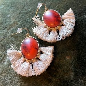 Pierced tassel accent earrings